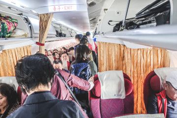 Flight was full of North Korean businessmen & women